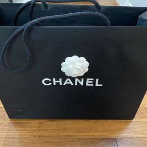 Chanel paper shopping bag.